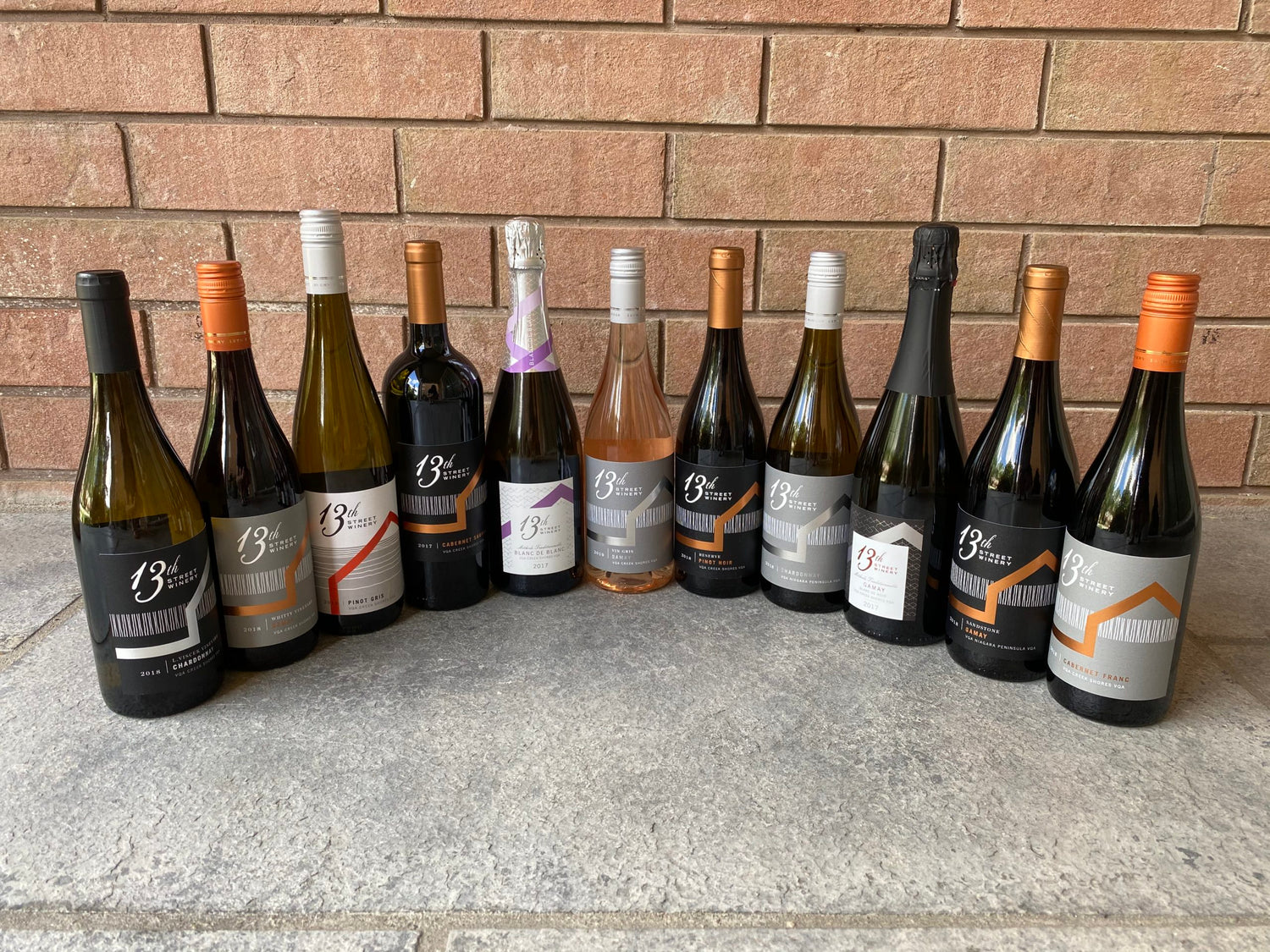 13th Street wine bottles arranged for a promotional photo