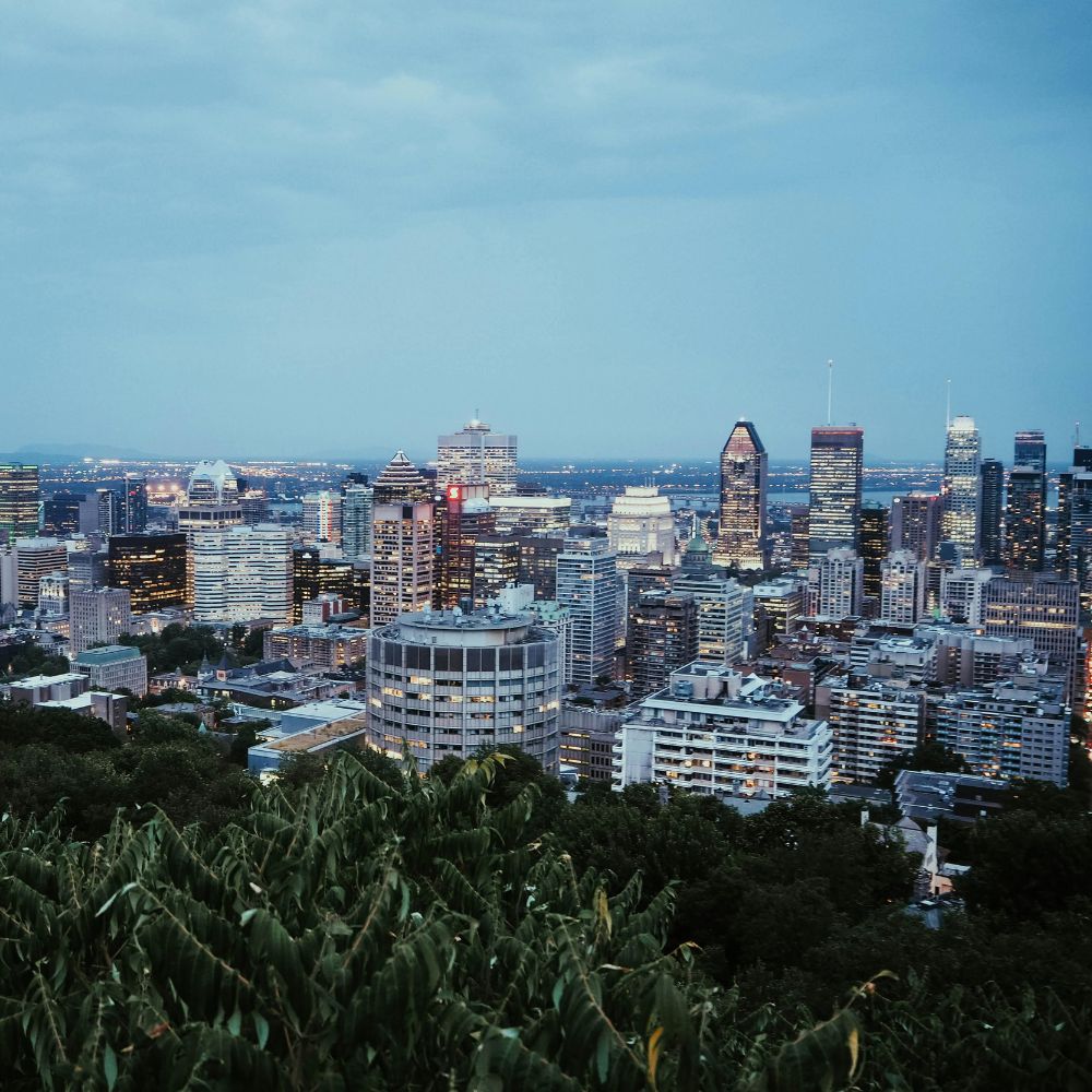 Skyline of downtown montreal with wine gift basket