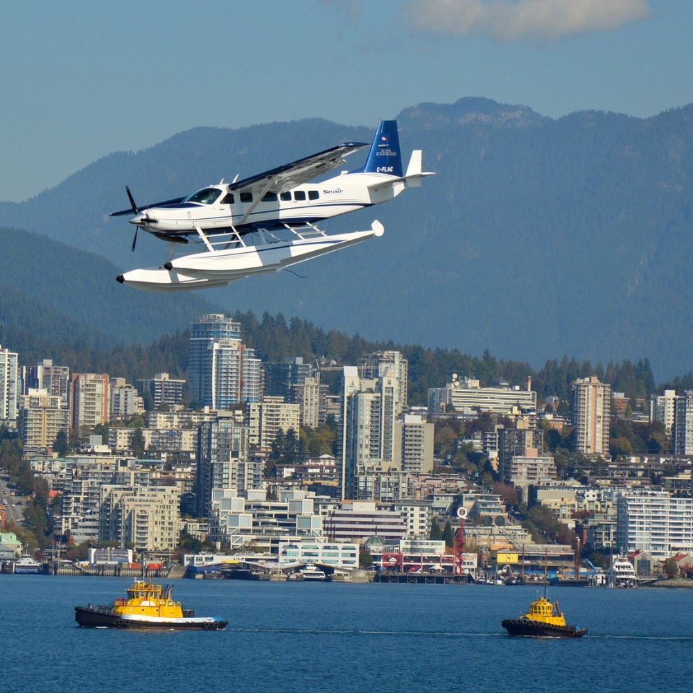 Seaplane landing in vancouver delivering wine gift basket