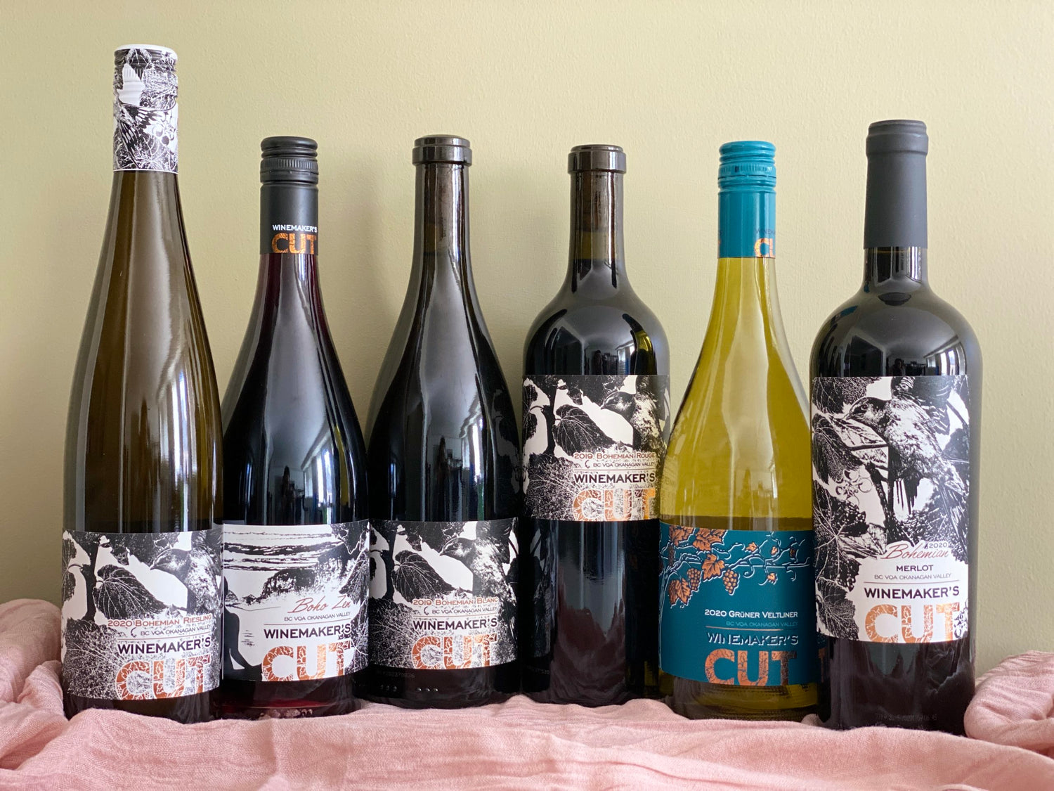 Winemaker's wine bottles on display for promotional club subscription